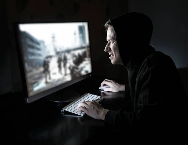 Young gamer in the dark — Stock Photo, Image