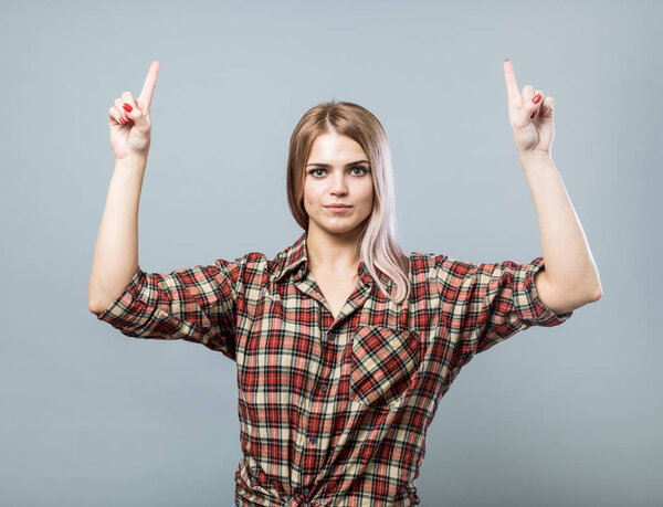 Young woman pointing