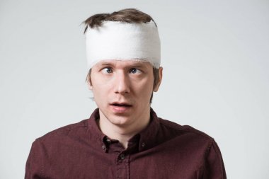 Man with bandage on his head clipart