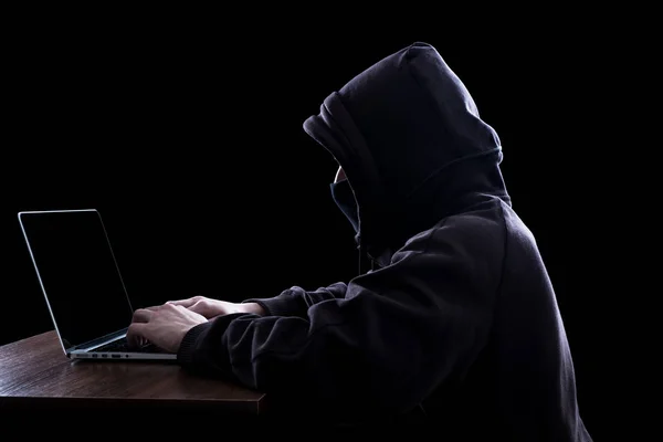 Anonymous hacker in the dark
