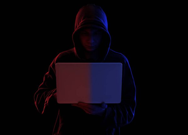 Анонимный хакер в темноте
