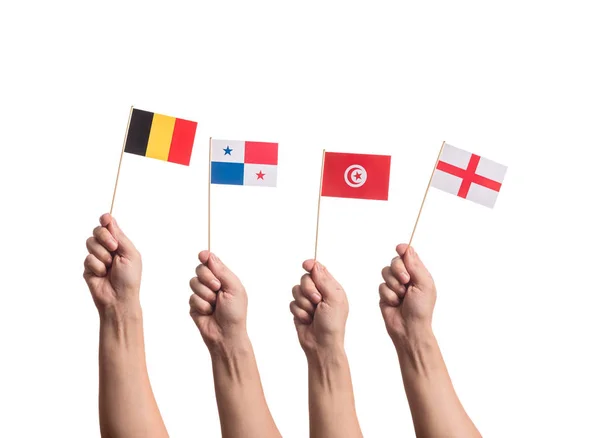 Drapeaux minuscules dans les mains — Photo