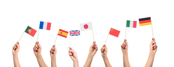 National flags in hands — Stock Photo, Image