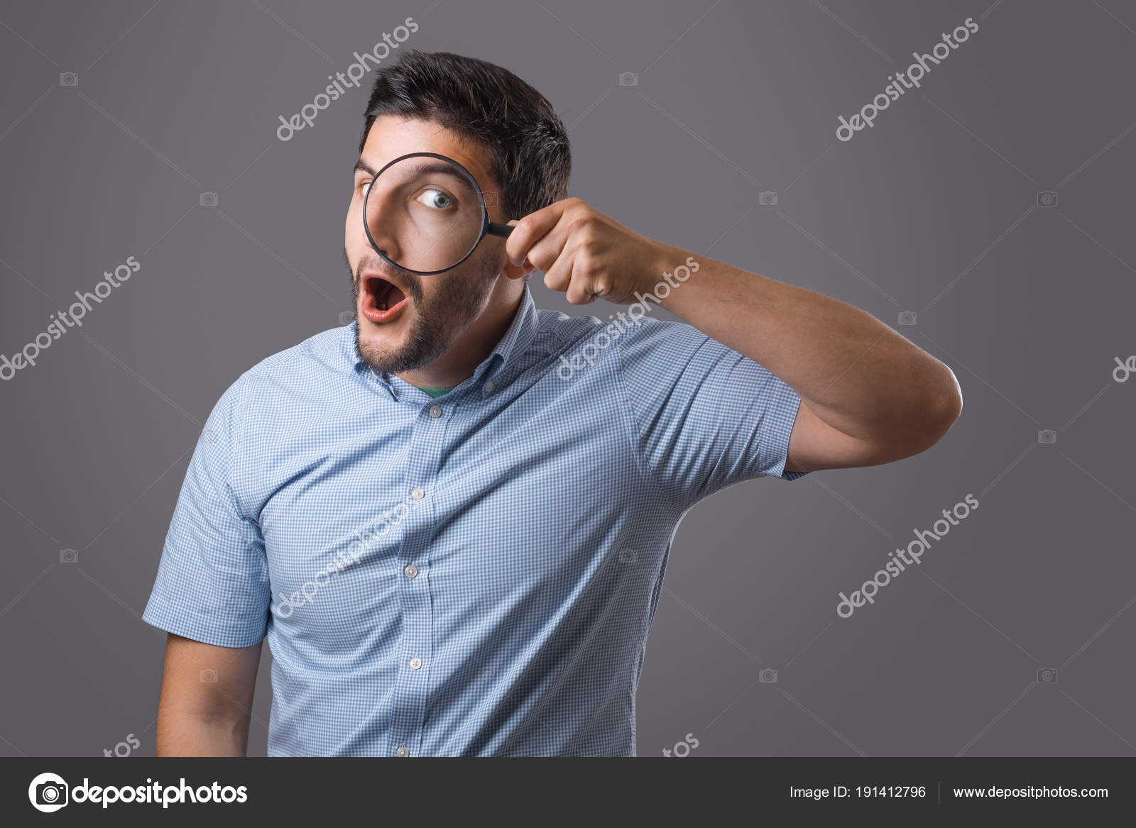 depositphotos_191412796-stock-photo-young-man-with-magnifier.jpg