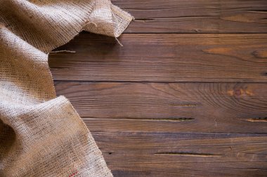 Ahşap arka plan ve çuval bezi