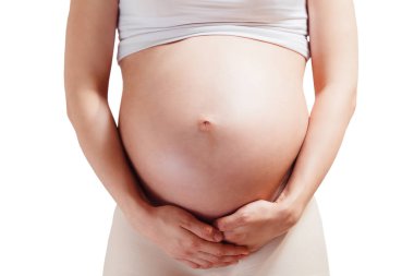 Koca göbekli hamile bir kadın tuvaleti kullanmak istiyor. Karın altı ağrısı..