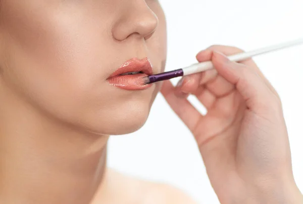 Makeup Artist Paints Lips Client Woman Lipstick Brush Isolated White — Stock Photo, Image