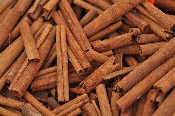 Tarçın pazara yakın çekim. Arka plan. Tarçın doku. Üstten Görünüm.