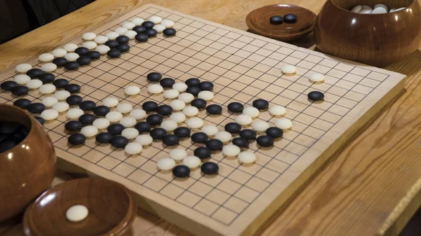 Chinees bord spel Go of Weiqi Rechtenvrije Stockafbeeldingen