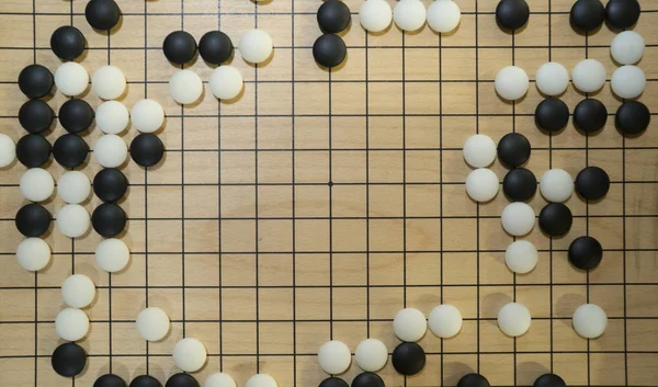 Chinesisches Brettspiel Go oder Weiqi mit Kopierplatz für Titel — Stockfoto