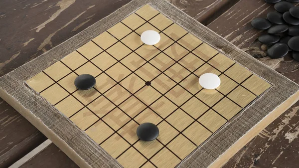 Chinese Go o Weiqi gioco da tavolo. Pietre bianche e nere e tavoletta fatta a mano. Posizione di apertura . — Foto Stock