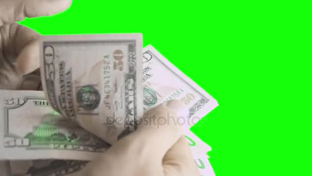 Man hands counting 50 dollars of bills. Close up. Green screen isolated background. — Stock Video