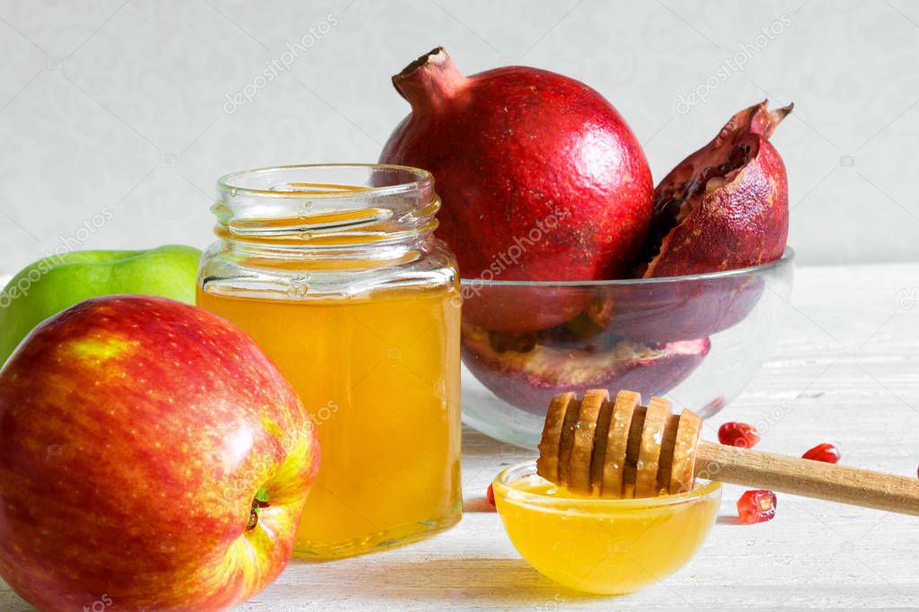 Honey, apple and pomegranate. traditional food for rosh hashanah