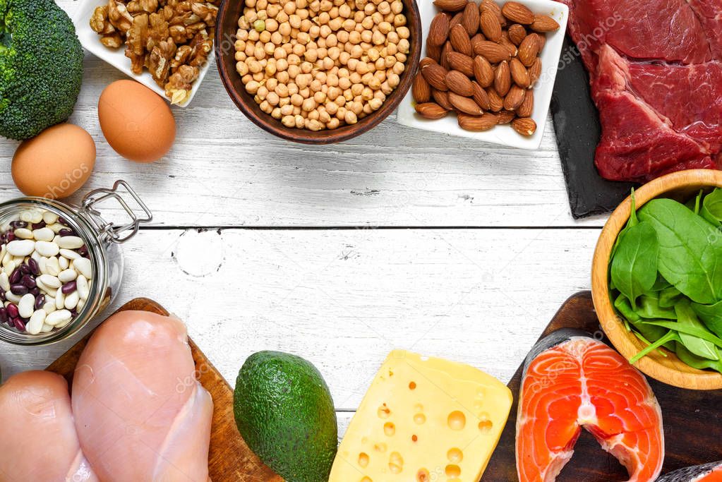 high protein food fish, meat, poultry, nuts, eggs and vegetables on
