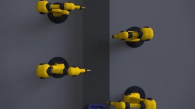Endüstriyel robotlar taşıyıcıya metal kaynak yaparlar.