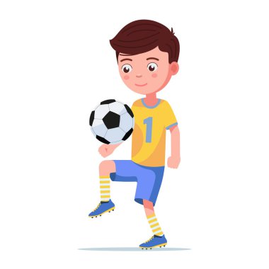 Futbolcu çocuk topa vuruyor.