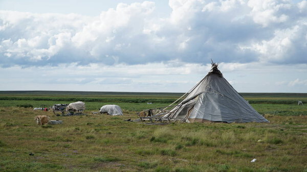 Lonely chum in the tundra. Sunset. Winter in tundra.