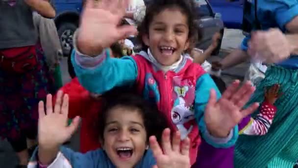 Refugees, Lesvos, Greece. November 2015. Children refugees shout at the camera. — Stock Video