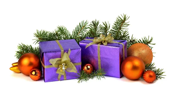 Christmas presents stacked up on white background — Stock Photo, Image