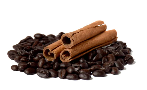 Several sticks of cinnamon and coffee beans. / Isolated / — Stock fotografie