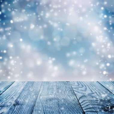 Noel arka plan mavi. Kar yağışı. Ahşap plakalar.