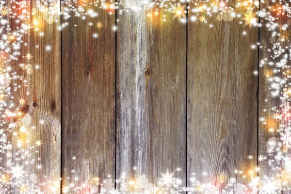 Χριστουγεννιάτικο φόντο με φώτα, bokeh, αστέρια και το χιόνι. Παλιά Μπόα — Φωτογραφία Αρχείου
