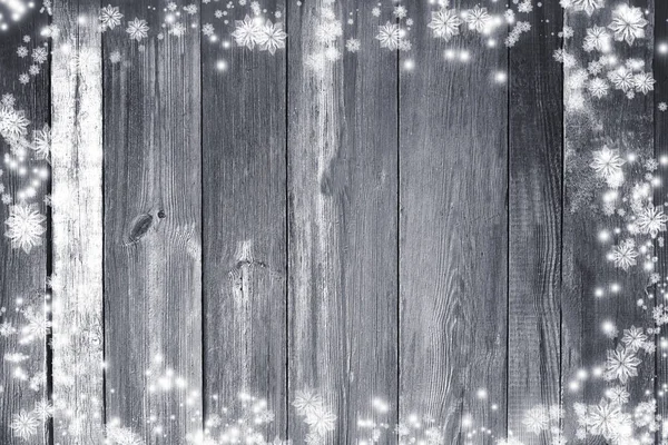 Oude houten Kerstmis achtergrond. Sneeuwvlokken op versleten planken. Nieuw — Stockfoto