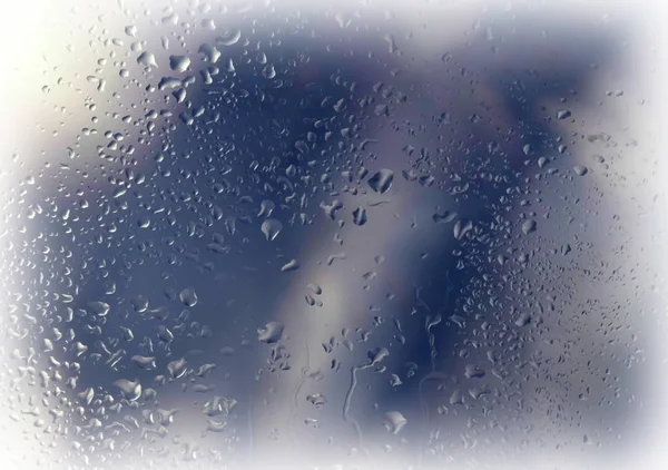 Tropfen und Frost auf dem Glas. die Kühle des frühen Morgens. — Stockfoto