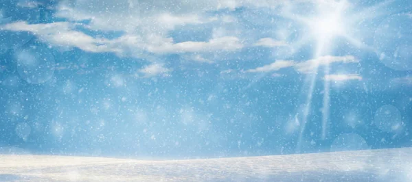 falling snow with snowflakes and clouds. Winter blue background