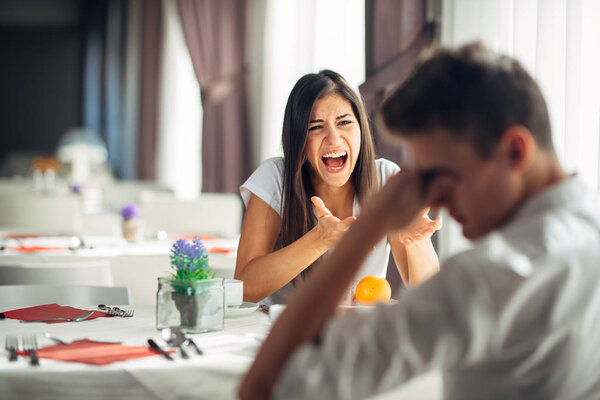 Screaming woman arguing.Judging stressed female having a nervous breakdown.Defending opinion.Fighting for rights.Panic attack.Negative event reaction.Bullying, verbal violence.Accusing, showing anger
