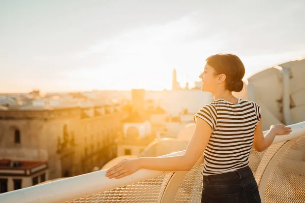 Happy Woman Tourist Enjoying Sunset Cityscape Panorama Seville Viewpoint Amazed — стоковое фото