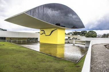 Curitiba, Brazil, December 30, 2017: front of Museum Oscar Niemeyer, located at Curitiba city, capital of Parana state, Brazil. It was a cloudy day. clipart