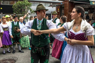 Sao Paulo, SP, Brazil, May 27, 2017. Presentation of German Folk Dances during a typical party in the streets of Brooklin neighborhood, south of Sao Paulo clipart