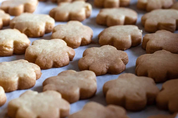 Butter cookies made from wheat flour, sugar and butter, with selective focus