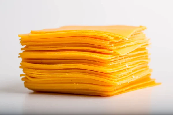 Φέτες τυρί τσένταρ, κοντινό πλάνο — Φωτογραφία Αρχείου