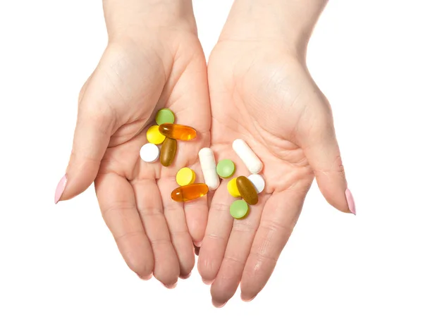 Pílulas Várias Cores Mão Sobre Fundo Branco Tomando Sua Medicação — Fotografia de Stock