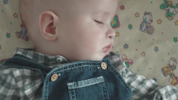 Baby is sleeping in the cradle — Stock Video