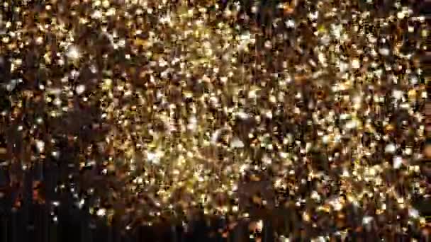 Abstracte achtergrond met glanzende bokeh sparkles. Gouddeeltjes glitter. — Stockvideo