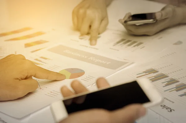 human hands with over business documents at meeting sucessful of business