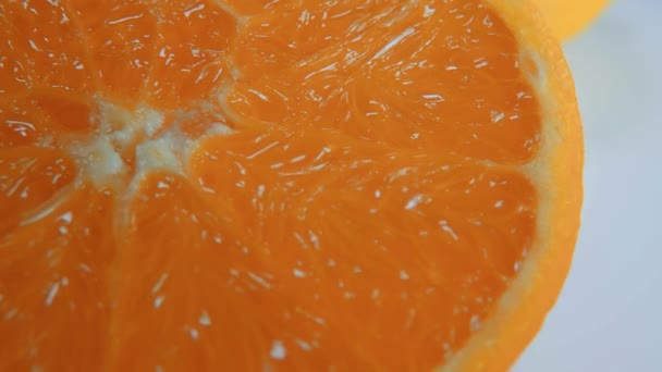 Macro shot of fresh fruits - juicy oranges — Stock Video