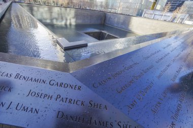 9-11 Memorial Fountains at Ground Zero - World Trade Center- MANHATTAN - NEW YORK - APRIL 1, 2017 clipart