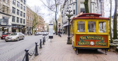 Old town trolley tours in Vancouver - VANCOUVER - CANADA - APRIL 12, 2017 clipart