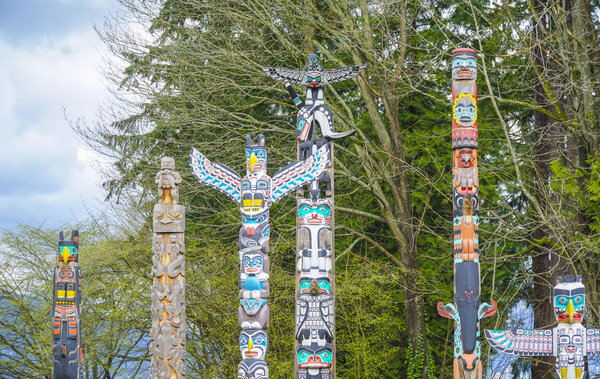 Famous Totem poles at Stanley Park Vancouver - VANCOUVER - CANADA - APRIL 12, 2017