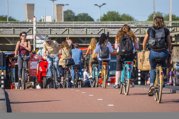 Amsterdam - a city full of bikers - typical view — Stock Photo, Image