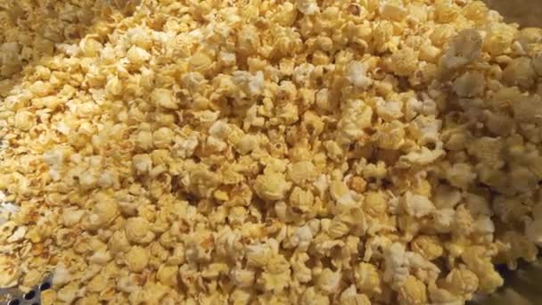 Huge amount of fresh made popcorn — Stock Video