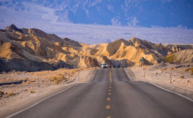 Beautiful road through the Death Valley National Park in California clipart