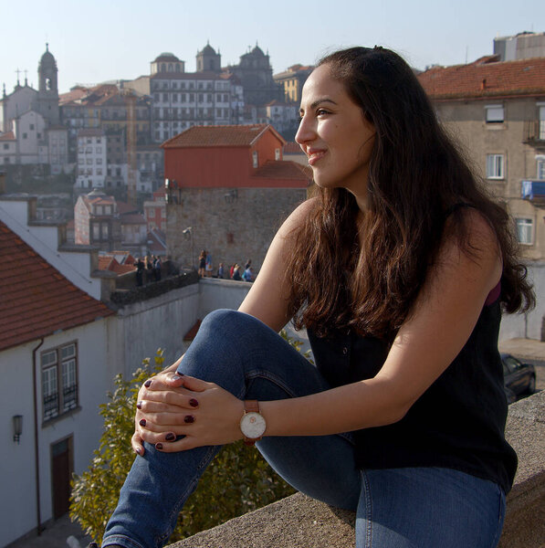 Cute girl in the city of Porto in Portugal