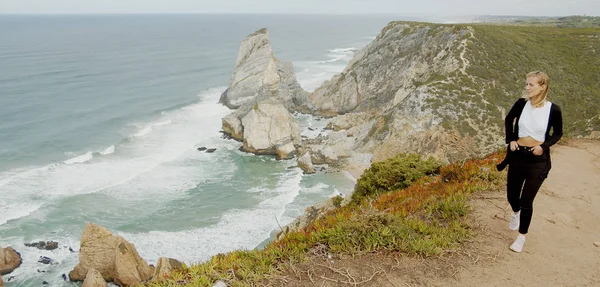 Beautiful woman relaxes at Cabo da Roca in Portugal - Sintra Natural Park — 스톡 사진
