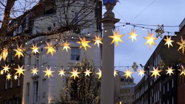 Amazing Christmas lights Seven Dials London - LONDON, ENGLAND - DECEMBER 10, 2019 — Stock Video