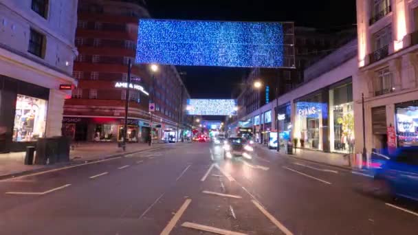 Timelapse shot Kerstmis in Oxford Street in Londen - Londen, Engeland - 10 december 2019 — Stockvideo